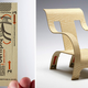Illustration for article titled This Brilliant Business Card Transforms into a Tiny Chair